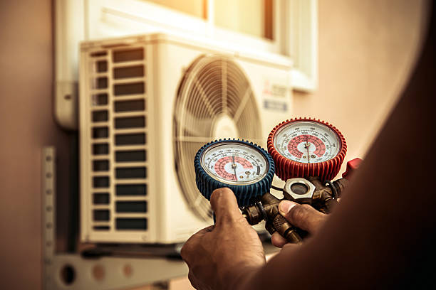 Professional Air Conditioning Service technician working in Northfield, OH